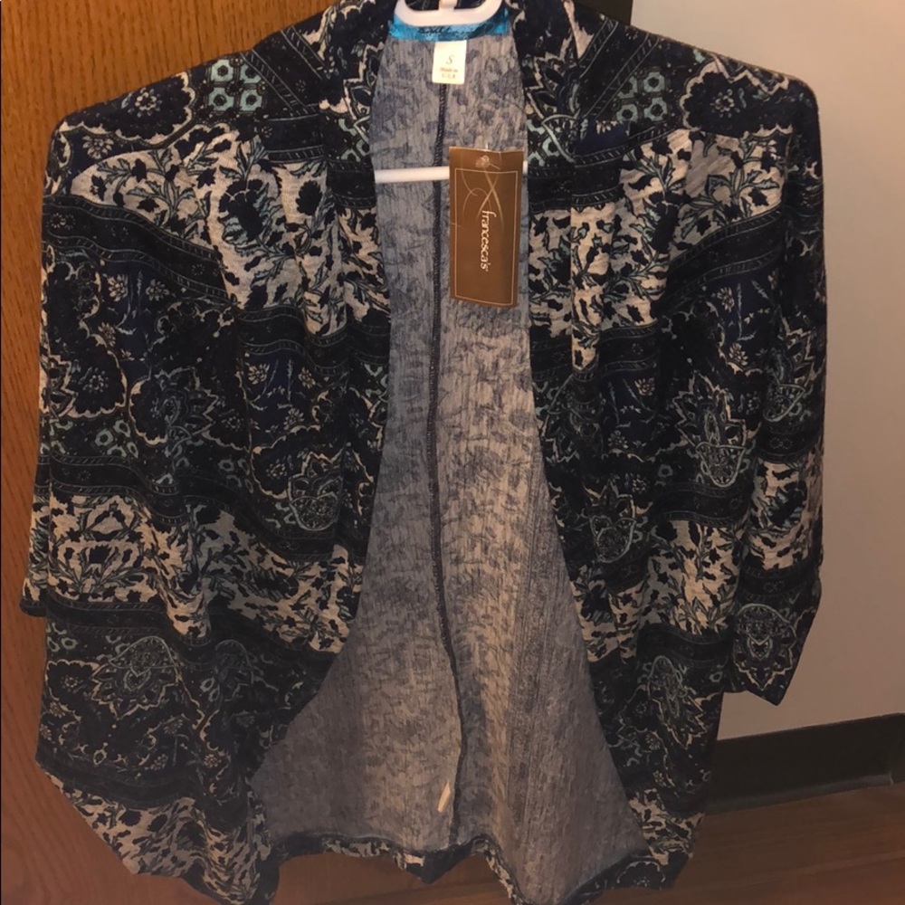 Blue Francesca’s open sweater. Never worn.